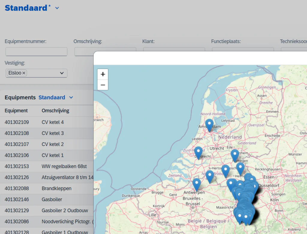 A **field service management** interface shows equipment details and filters, partially obscured by an interactive map. This map displays numerous blue pins across the Netherlands and Belgium, featuring zoom controls `+`, `-`. UI text includes: Standaard *, Equipmentnummer:, Omschrijving:, Klant:, Functieplaats:, Technieksoort:, Vestiging: Elsloo x, Equipments Standaard, Equipment, Omschrijving, 401302109 CV ketel 4, 401302108 CV ketel 3, 401302107 CV ketel 2, 401302106 CV ketel 1, 401302153 WW regelbalken 68st, 401302126 Afzuigventilator 8 t/m 14, 401302088 Brandkleppen, 401302146 Gasboiler, 401302129 Gasboiler 2 Oudbouw, 401302086 Noodverlichting Pictogr. (, 401302128 Gasboiler 1 Oudbouw.