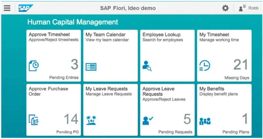Een SAP Fiori-interface toont Human Capital Management-tegels voor diverse taken, zoals urenregistratie en verlof, ondersteund door SAP technology voor efficiënt beheer binnen een overzichtelijke digitale werkomgeving. **Tekst:** SAP SAP Fiori, Ideo demo Robb Human Capital Management Approve Timesheet Approve/Reject timesheets 3 Pending Entries My Team Calendar View my team calendar Employee Lookup Search for employees My Timesheet Manage working time 21 Missing Days Approve Purchase Order 14 Pending PO My Leave Requests Manage Leave Requests Approve Leave Requests Approve/Reject Leaves 5 Pending Requests My Benefits Display benefit plans 1 Pending Plans