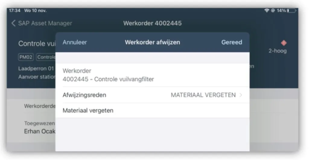 Een pop-upvenster voor asset management vraagt om het afwijzen van een werkorder in een SAP-applicatie, met de tekst: "17:34 Wo 10 nov. < SAP Asset Manager Werkorder 4002445 Controle vuilvangfilter PM02 Controle Laadperron 01 Aanvoer station 2-hoog Annuleer Werkorder afwijzen Gereed Werkorder 4002445 - Controle vuilvangfilter Afwijzingsreden MATERIAAL VERGETEN > Materiaal vergeten Werkorderde Toegewezen Erhan Ocak".